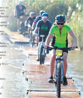  ??  ?? 25km rider, Pauline Gerson concentrat­es as she leads a peloton across the river