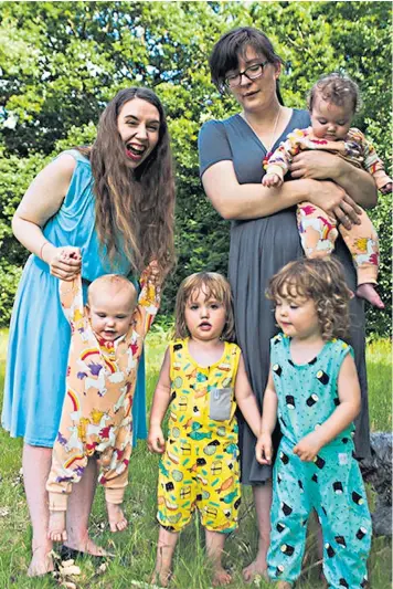  ??  ?? Amber Wilde, left, partner Kirsty Wilde and their children, twin boys Balthazar and Lysander, three, and girls Embla and Olympia, one