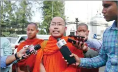  ?? HONG MENEA ?? Chbar Ampov pagoda chief Hok Sokhonn speaks to the press yesterday in Phnom Penh.