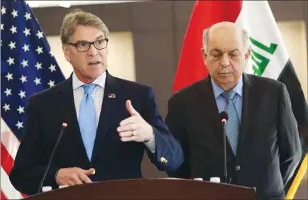  ??  ?? Iraq’s Minister of Oil Thamir al-Ghadhban (right) speaks during a joint press conference with US Energy Secretary Rick Perry in the Iraqi capital of Baghdad yesterday. Washington gave Iraq a 45-day waiver over imports of Iranian gas when it reimposed sanctions on Iran’s oil sector on November 5.