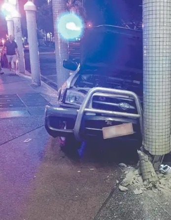  ?? Picture: SUPPLIED ?? The 4WD after crashing into a pillar on Knuckey St