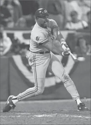  ?? DOUG MILLS, THE ASSOCIATED PRESS ?? Toronto Blue Jays’ Dave Winfield hits the series winning two-RBI double in the 11th inning of Game Six of the World Series against the Atlanta Braves, in Atlanta, Oct. 24, 1992.