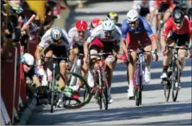  ?? CHRISTOPHE ENA — THE ASSOCIATED PRESS ?? Peter Sagan of Slovakia, left, sprints as Britain’s Mark Cavendish crashes during the sprint of the fourth stage of the Tour de France cycling race over 207.5 kilometers (129 miles) with start in Mondorf-les-Bains, Luxembourg, and finish in Vittel,...