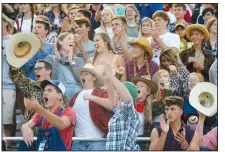  ?? NWA Democrat-Gazette/ANDY SHUPE ?? Springdale Har-Ber students celebrate Friday before the start of the first half against Russellvil­le at Wildcat Stadium in Springdale.