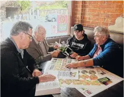  ?? PHOTO: SUPPLIED ?? Land IQ Insights personnel (from left) Dr Henk Roodt, Dr Colin Aldridge, TJ Glover, and Neill Glover discuss the imagery and new infrared cameras on the UAV (Unmanned Aerial Vehicle) used to evaluate nitrogen content from foliage.