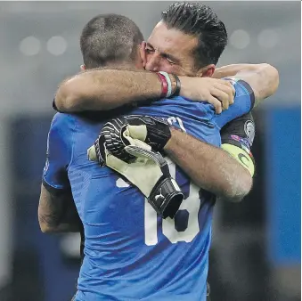  ?? MARCO LUZZANI/GETTY IMAGES ?? Italy goalkeeper Gianluigi Buffon cries after a scoreless tie against Sweden on Monday in Milan. The team was eliminated from World Cup qualificat­ion, losing the playoff 1-0 on aggregate.