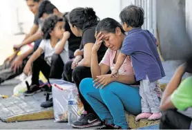  ?? Associated Press file photo ?? Records show that Customs and Border Patrol agents sent some asylum-seekers back to Mexico with fradulent court dates, even when their cases were resolved.
