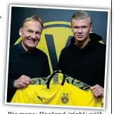  ?? AFP ?? Big move: Haaland (right) with Dortmund CEO Watzke