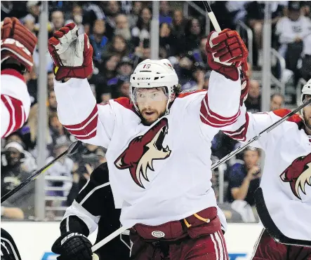  ?? — THE ASSOCIATED PRESS FILES ?? Shane Doan, centre, announced his retirement after 21 seasons with the Arizona Coyotes/Winnipeg Jets franchise. The 40-year-old from Halkirk, Alta., is the franchise’s all-time leader in several key statistica­l categories, including games played,...