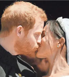  ?? BEN BIRCHHALL/AP ?? Prince Harry and Meghan Markle tie the knot on May 19.