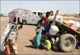  ?? (AP/Marwan Ali) ?? Refugees from the Tigray region of Ethiopia wait to register for admission Saturday at a United Nations center in Hamdayet, Sudan. The fighting in Tigray has caused more than 17,000 refugees to flee into Sudan.