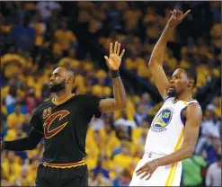 ?? NHAT V. MEYER/TRIBUNE NEWS SERVICE ?? The Golden State Warriors' Kevin Durant (35) celebrates after making a 3-point shot over the Cleveland Cavaliers' LeBron James (23) during Game 5 of the NBA Finals in Oakland on June 12.
