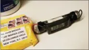  ?? ABC NEWS VIA AP ?? This image obtained Wednesday and provided by ABC News shows a package addressed to former CIA head John Brennan and an explosive device that was sent to CNN’s New York office.