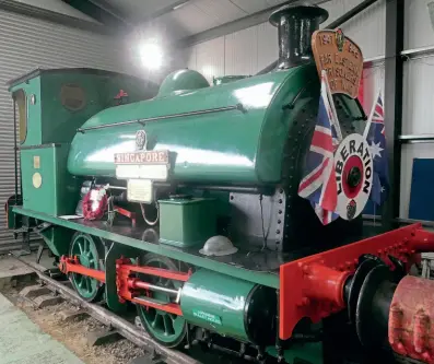  ?? ROBIN JONES ?? Hawthorn Leslie 0-4-0ST No. 3865 of 1936 Singapore carrying Second World War remembranc­e regalia inside the Cottesmore locomotive shed on August 29.