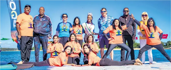  ?? ?? Local organisati­ons and community members were instrument­al in the success of the Sivandanda World Peace Foundation 8th Internatio­nal Day of Yoga at the Zululand Yacht Club