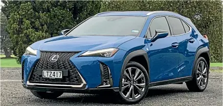  ??  ?? Higher ride height notwithsta­nding, the Lexus UX passes for a compact hatchback pretty easily.