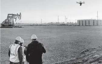  ?? Baker Hughes ?? Houston oil field services company Baker Hughes has pledged to net-zero carbon dioxide emissions for its worldwide operations by 2050. Its drone, LUMEN, detects methane emissions.