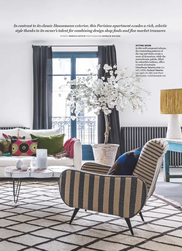  ??  ?? SITTING ROOM
In this well-composed scheme, the contrastin­g patterns of the rug and chairs create a sense of dynamism, while the monochrome palette, lifted by colourful cushions, o≠ers a touch of restraint. Chauffeuse Tabarka chair (on left), €890;...