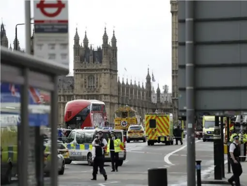  ??  ?? Police secure the area on the south side of Westminste­r Bridge close to the Houses of Parliament in London (AP)