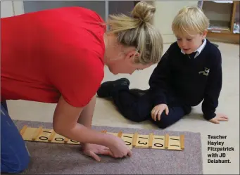  ??  ?? Teacher Hayley Fitzpatric­k with JD Delahunt.