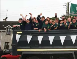  ??  ?? The St Nicholas team are paraded through the streets of Dunlavin after their wonderful Féile victory last weekend. Photo: Joe Byrne