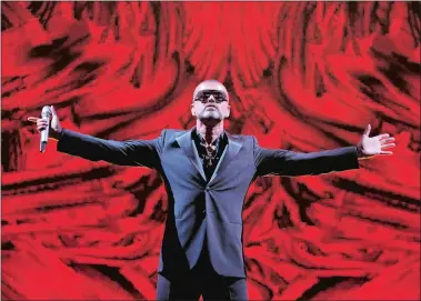  ?? FRANCOIS MORI/AP PHOTO, FILE ?? In this Sept. 9, 2012 file photo, British singer George Michael performs at a concert to raise money for AIDS charity Sidaction, during the Symphonica tour at Palais Garnier Opera house in Paris, France.