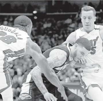  ?? RUSTY COSTANZA/AP ?? Andre Iguodala (left) and Duncan Robinson (right) are part of the Heat’s 2020-21 intrigue, as they attempt to repeat as Eastern Conference champions next season.