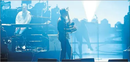  ?? PHOTO BY EVAN AGOSTINI/INVISION/AP ?? John Baldwin Gourley, of Portugal. The Man, performs at the 2018 MusiCares Person of the Year tribute honoring Fleetwood Mac at the Radio City Music Hall in January.