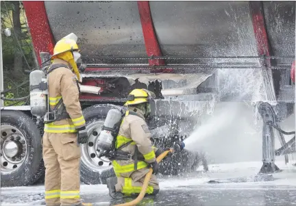  ?? FILE PHOTO ?? Firefighte­rs battle a transport truck fire on the Trans Canada 104 in Pictou County.