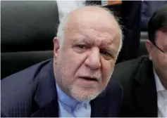  ??  ?? Zanganeh talks to journalist­s at the beginning of an OPEC meeting in Vienna, Austria. Zanganeh praised the OPEC for what he said was the producer group’s ability to reach agreement despite intense internal political difference­s. – Reuters photo