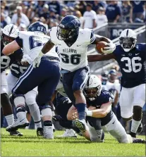  ?? BARRY REEGER —ASSOCIATED PRESS FILE ?? Villanova running back Jalen Jackson, gaining yardage in September at Penn State, ran for 104yards and two touchdowns on Saturday against Rhode Island.