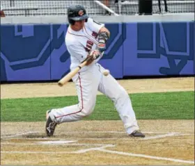  ?? TOM NASH - DIGITAL FIRST MEDIA ?? Spring City’s Ryan Harvey hits a two-run single in the second inning against AmbridgeBa­den Tuesday.