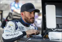  ?? JASON MINTO — THE ASSOCIATED PRESS ?? Ross Chastain looks at data on a computer during a NASCAR Xfinity Series auto race practice at Dover Motor Speedway, Saturday in Dover, Del.