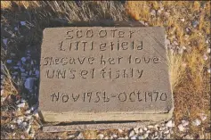  ?? (The Reno Gazette-Journal/Ed Komenda) ?? A marker for a grave rests at a pet cemetery in the desert between Searchligh­t and Boulder City, Nev., where southern Nevadans have been informally burying their furry friends for almost 60 years.