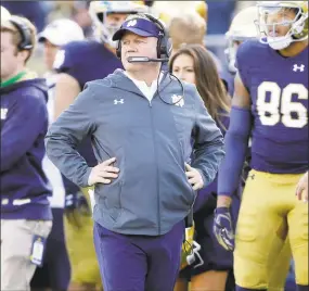  ??  ?? Notre Dame head coach Brian Kelly watches during the second half against Pittsburgh last season in South Bend, Ind.