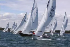  ?? ?? Above left to
right: A fleet of Nordic Folkboats racing in the UK Nationals