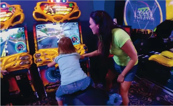  ??  ?? Visitors of all ages enjoy arcade games inside the Fun Connection at Isleta Casino & Resort.