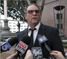  ??  ?? In this Jan. 8, 2018, file photo, Michael Channels speaks to reporters after a hearing in Los Angeles Superior Court in Los Angeles. A Kern County Superior Court commission­er ruled on Monday, that Jason Freeman of Florida can collect the remains of...