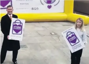  ??  ?? ●● Hyndburn council leader Miles Parkinson and MP Sara Britcliffe at the launch of the shop local campaign