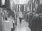  ?? NICOLAS GALINDO/THE COLUMBUS DISPATCH ?? A man walks down an aisle inside the Global Mall on Morse Road.