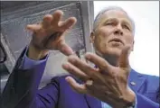  ?? Irfan Khan Los Angeles Times ?? WASHINGTON Gov. Jay Inslee says only he has the “fire in the belly” to start a green economy in the U.S.