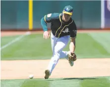  ?? Icon Sportswire via Getty Images ?? A’s third baseman Matt Chapman has won three defensive awards for his play in his first full season in the majors.