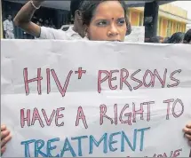  ?? REUTERS FILE ?? A woman at a protest against discrimina­tion towards the treatment of HIV/AIDS patients, on the outskirts of Siliguri, West Bengal.