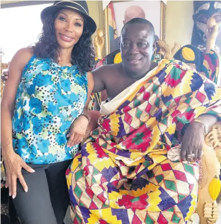  ??  ?? Deputy treasurer of the Democratic Party and Honorary Consul for Jamaica in Los Angeles, California, Lorna Johnson, poses with a chief at Twifo Village in Ghana.