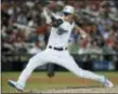  ?? THE ASSOCIATED PRESS ?? Milwaukee Brewers pitcher Josh Hader (71) throws during the eighth inning at the Major League Baseball All-Star Game, Tuesday in Washington.