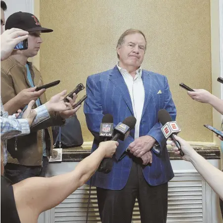  ?? AP PHOTO ?? ON THE SPOT: Bill Belichick holds court yesterday at the owners meetings in Orlando, Fla.