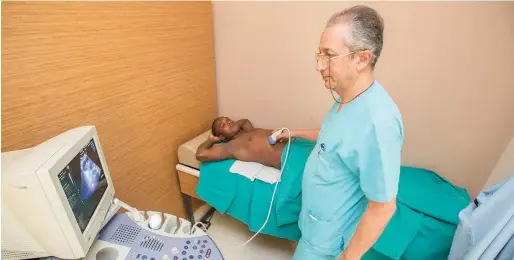  ??  ?? One of the doctors attending to a patient at the Nigerian Turkish Nizamiye Hospital