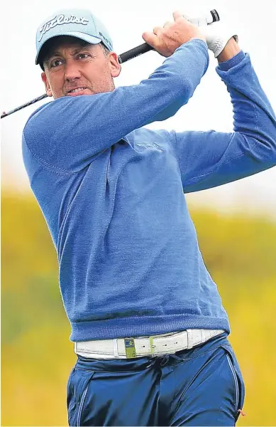  ??  ?? ■ Ryder Cup hero Ian Poulter has a share of the lead at Dundonald.