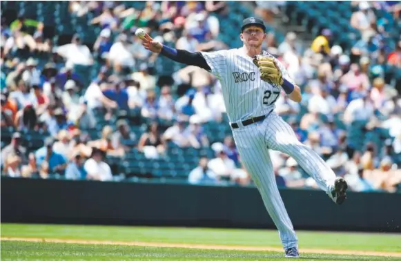  ?? Michael Reaves, The Denver Post ?? No. 27 on the Rockies’ roster, shortstop Trevor Story, had a terrific rookie season last year. He hit 27 homers and drove in 72 runs in just 97 games.