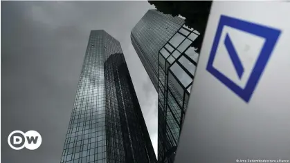  ?? ?? Deutsche Bank's headquarte­rs saw fresh raids over allegation­s the bank waited years to flag a suspicious transactio­n